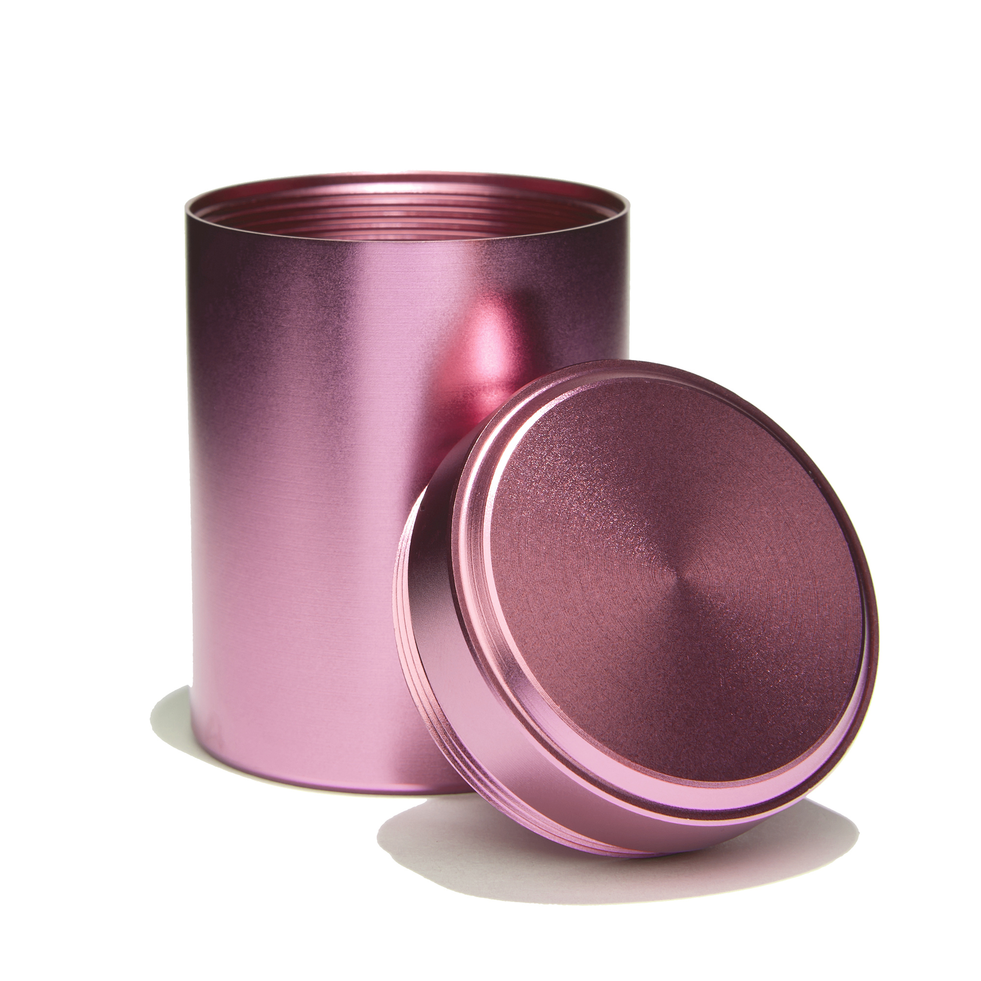 Geruchsdichte Aluminium-Dose in Rosa, geöffnet mit Schraubdeckel daneben